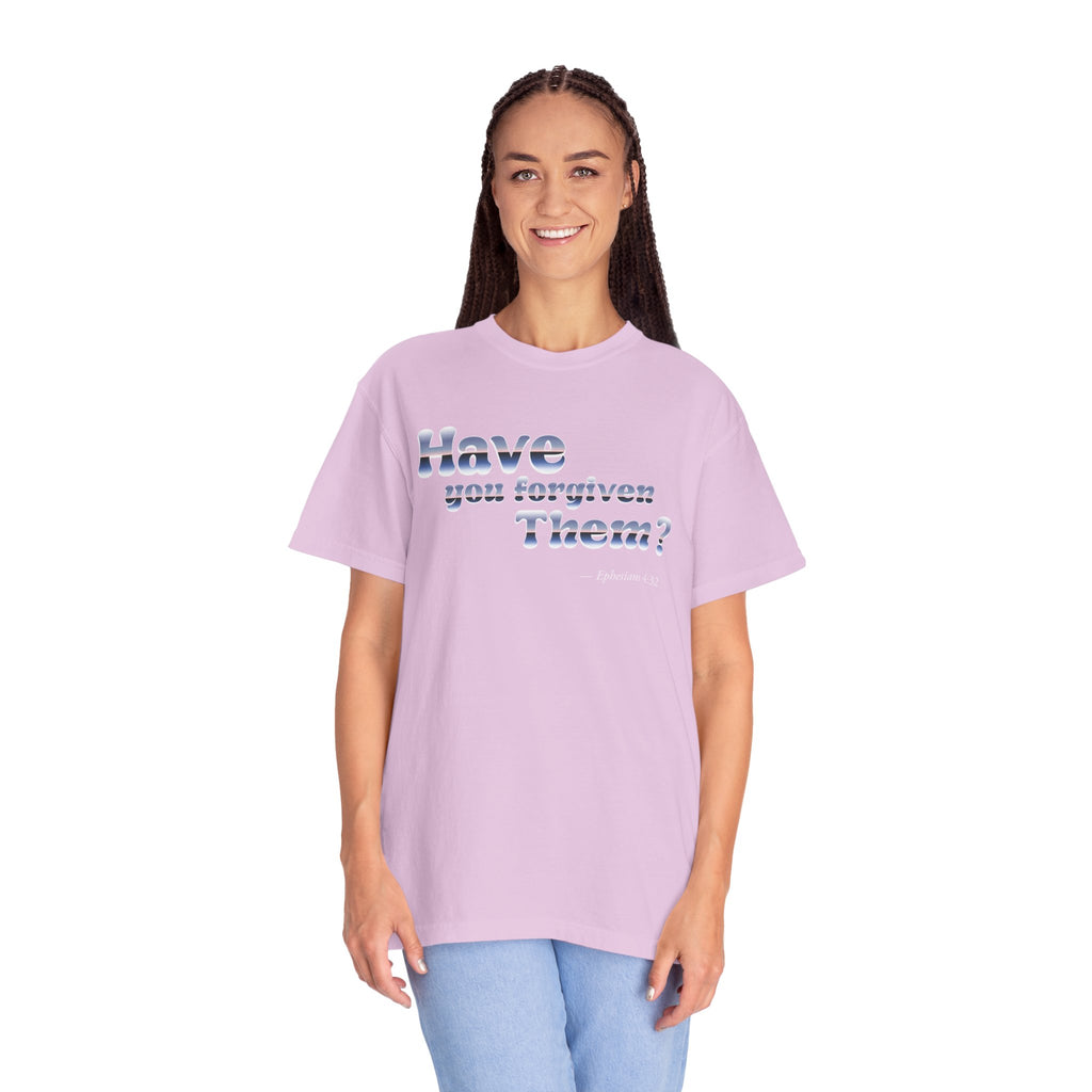 Person wearing a light purple t-shirt with text on a white background