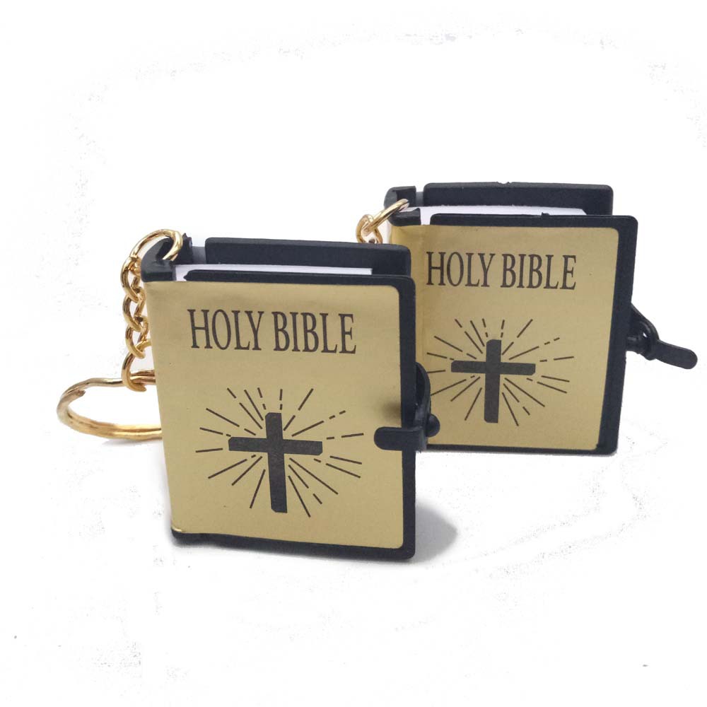 Two 'HOLY BIBLE' keychains with cross designs on a white background