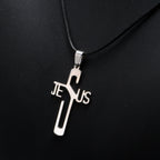 Silver cross pendant with 'Jesus' on a black background
