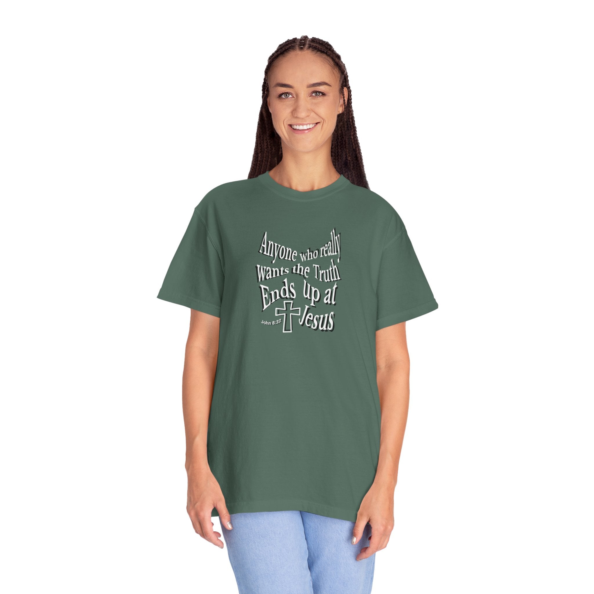 Woman wearing a green t-shirt with text on a white background