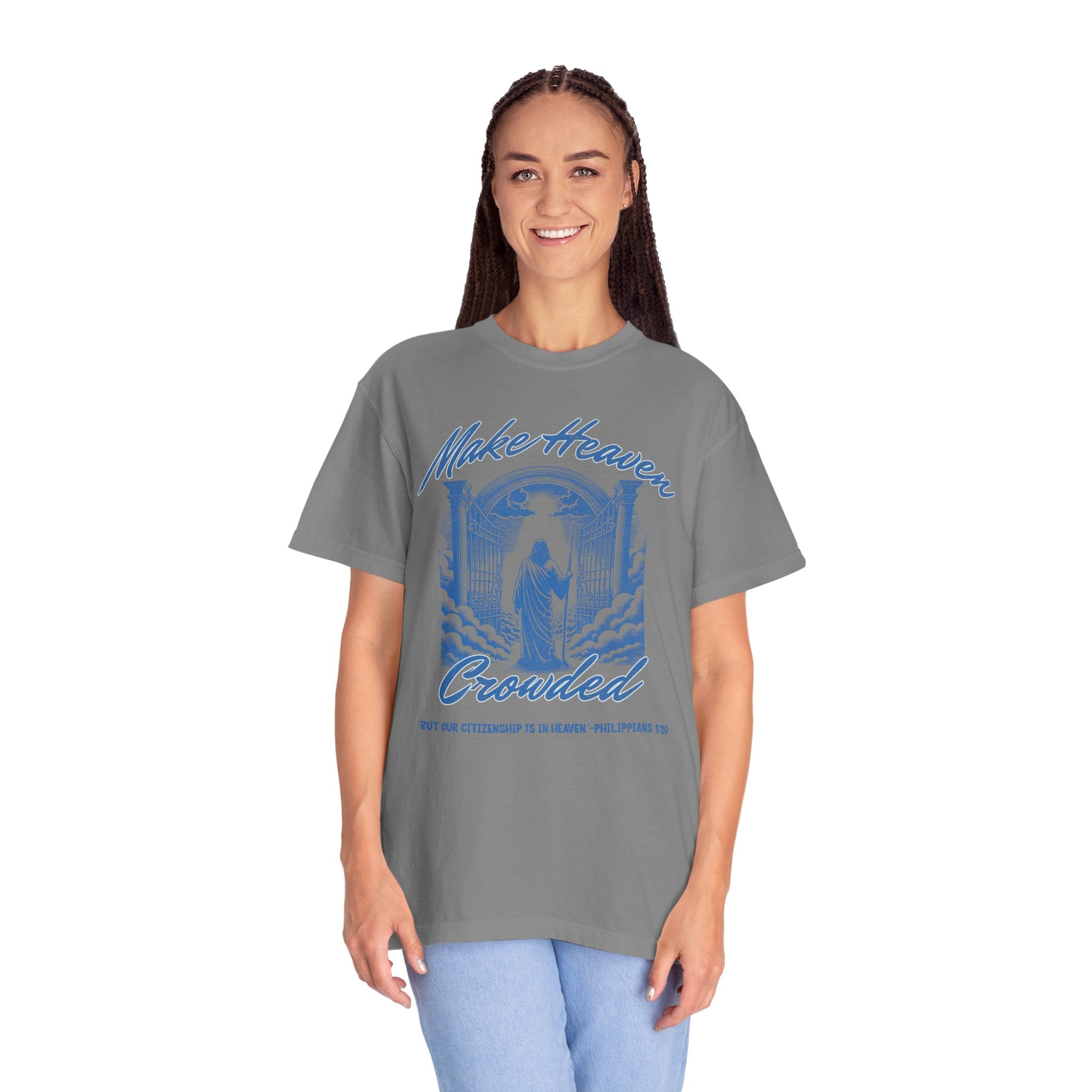 Woman wearing a gray t-shirt with a blue graphic design on a white background