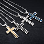 Four cross-shaped pendants on chains against a dark textured background