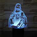 3D LED lamp shaped like a religious figure on a dark background