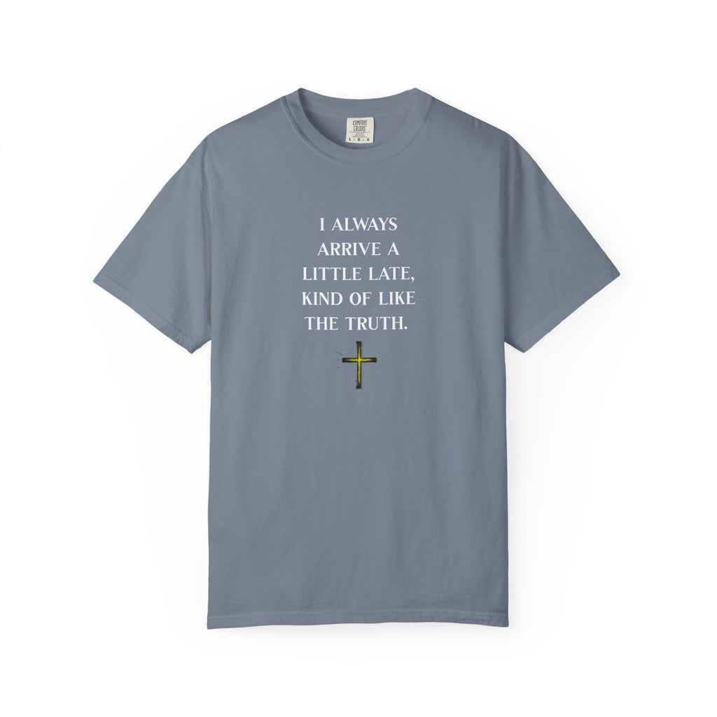 Teal t-shirt with a white cross and roots design on a white background