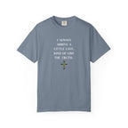 Teal t-shirt with a white cross and roots design on a white background