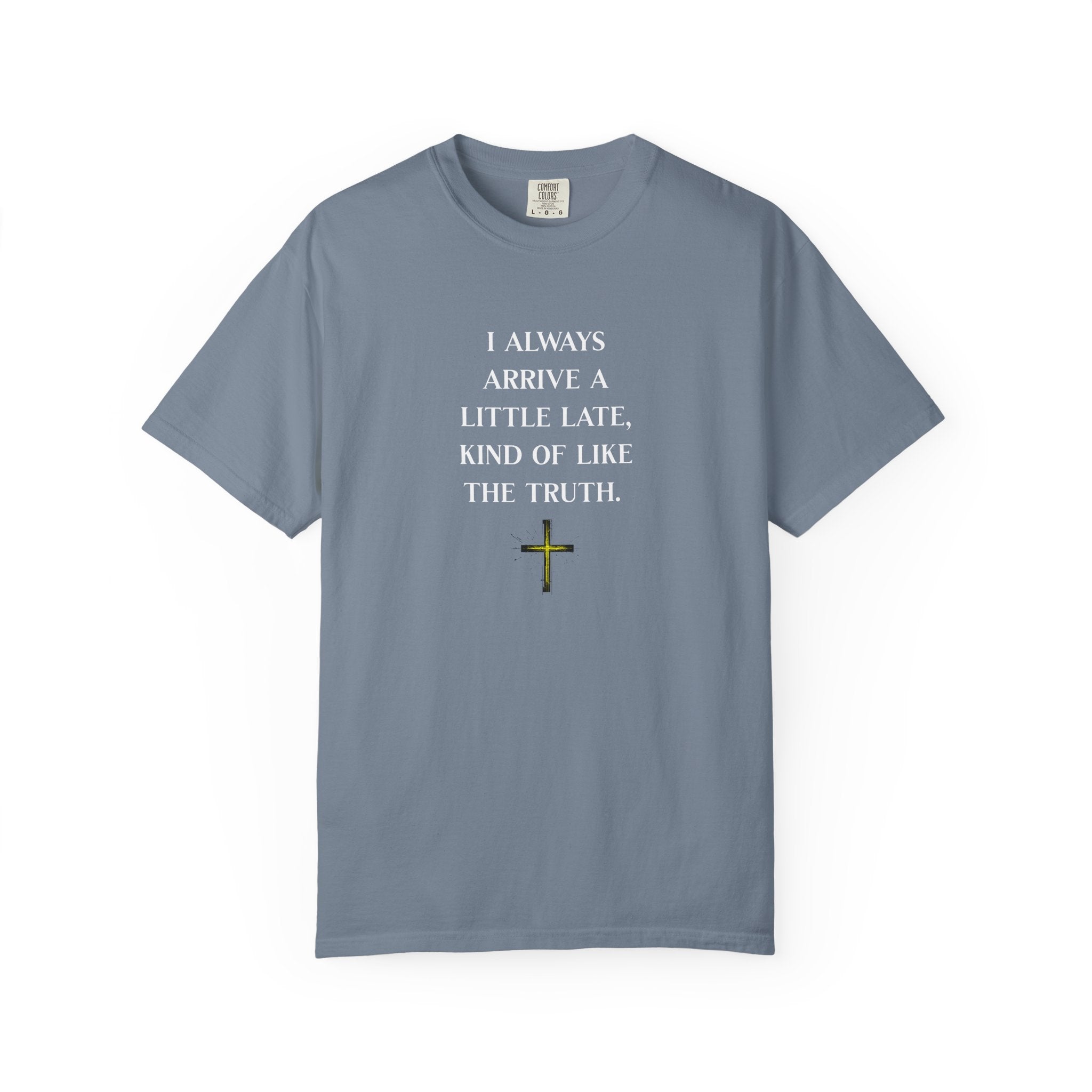 Teal t-shirt with a white cross and roots design on a white background