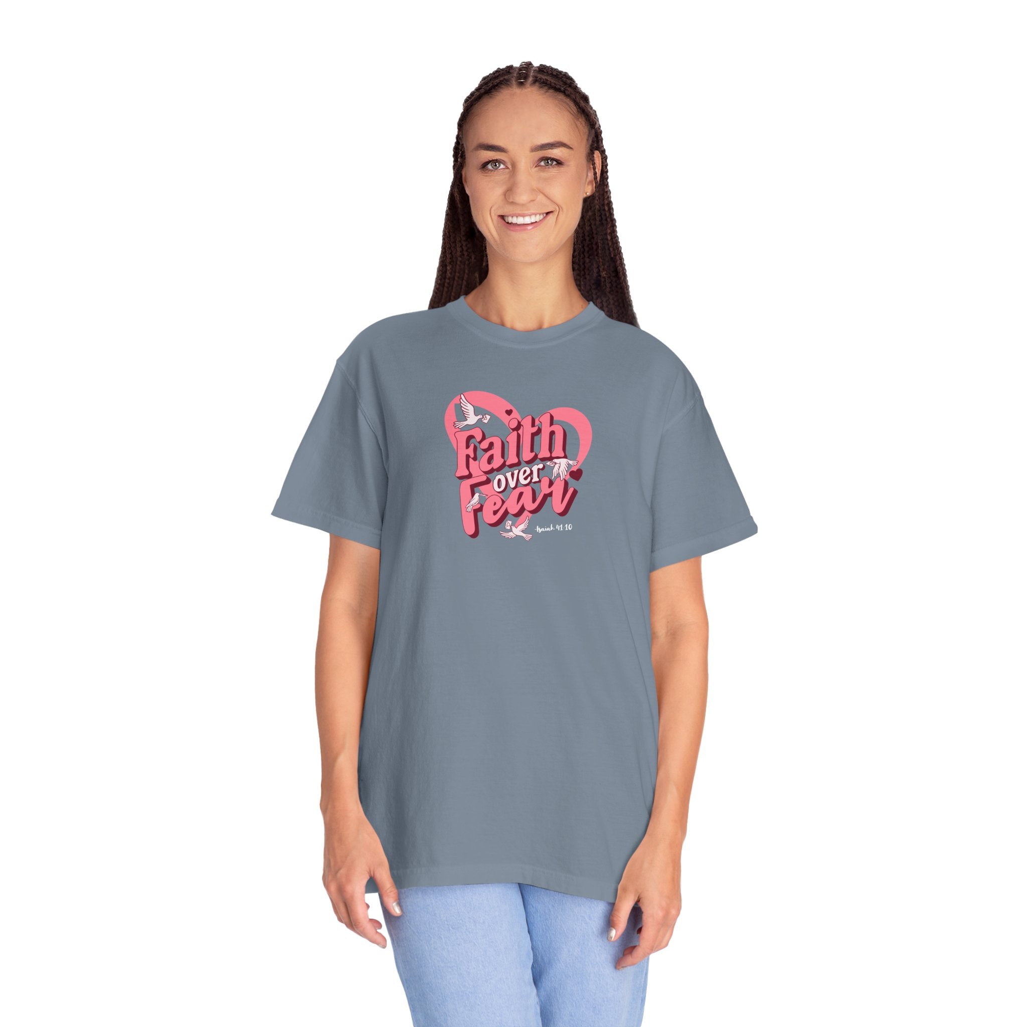 Person wearing a gray t-shirt with 'Faith over Fear' design on a white background