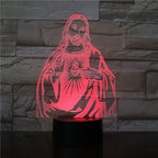 3D LED lamp shaped like a religious figure with red light on a stone wall background