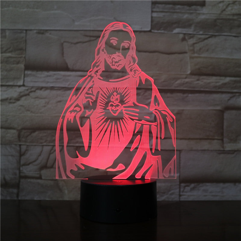3D LED lamp shaped like a religious figure with red light on a stone wall background