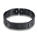 Black metal bracelet with engraved text on a white background