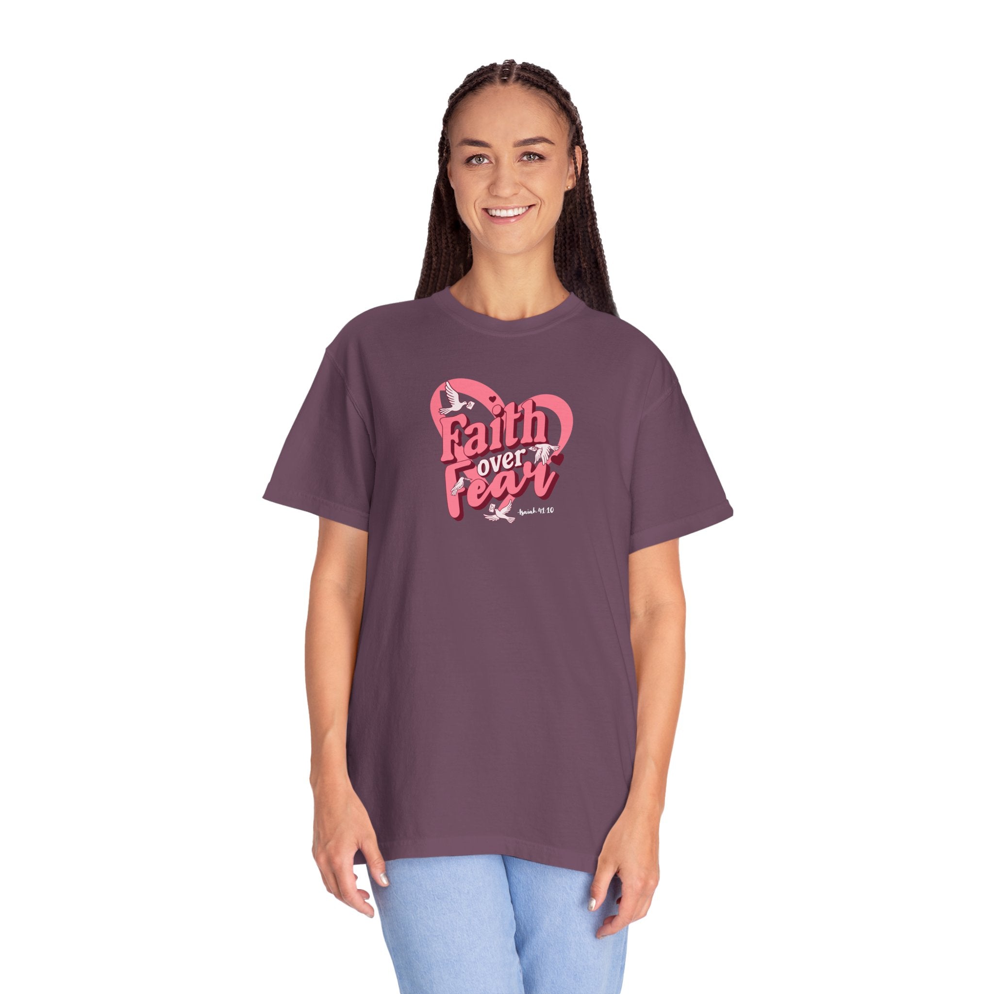 Woman wearing a purple t-shirt with 'Faith over Fear' design on a white background