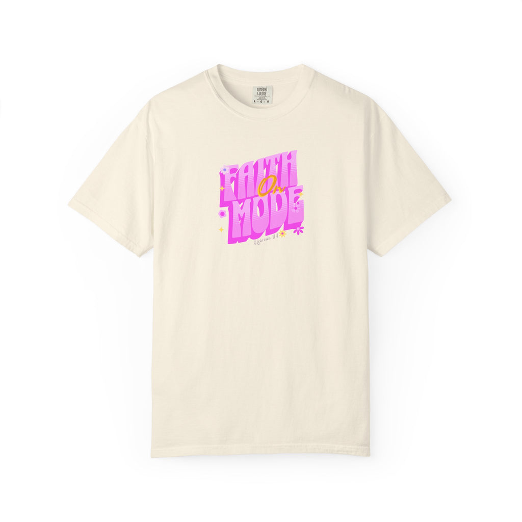 Beige t-shirt with colorful text design on a white background