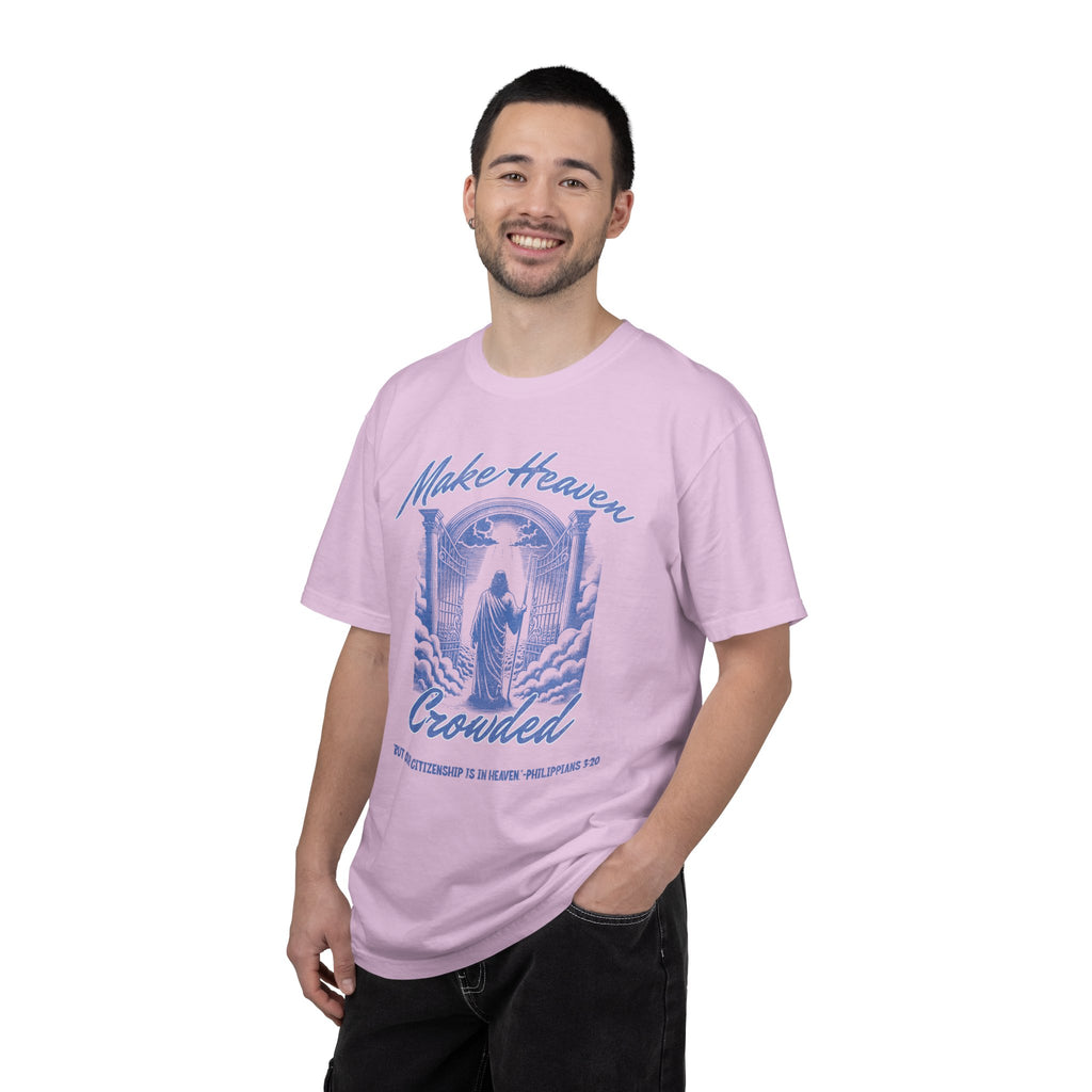 Man wearing a pink t-shirt with a graphic design on a white background