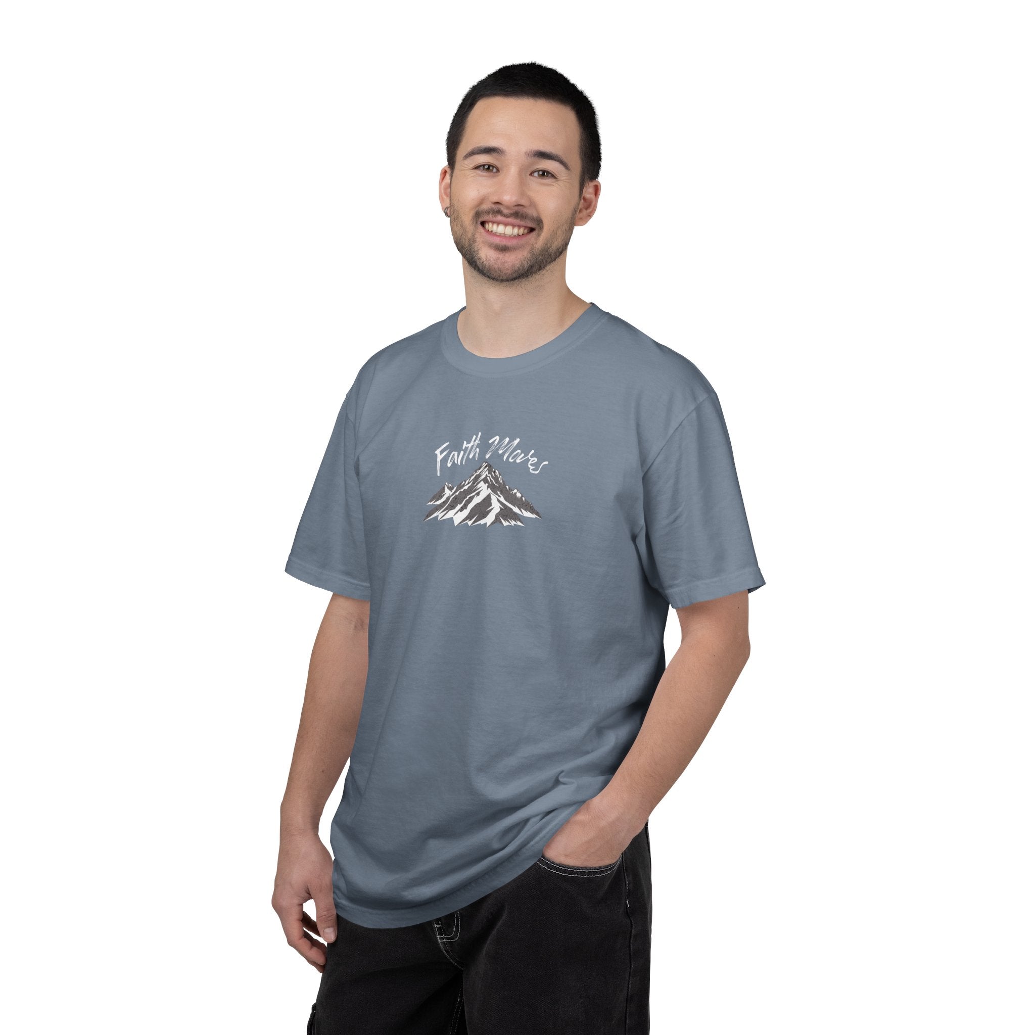 Man wearing a gray t-shirt with a graphic design on a white background