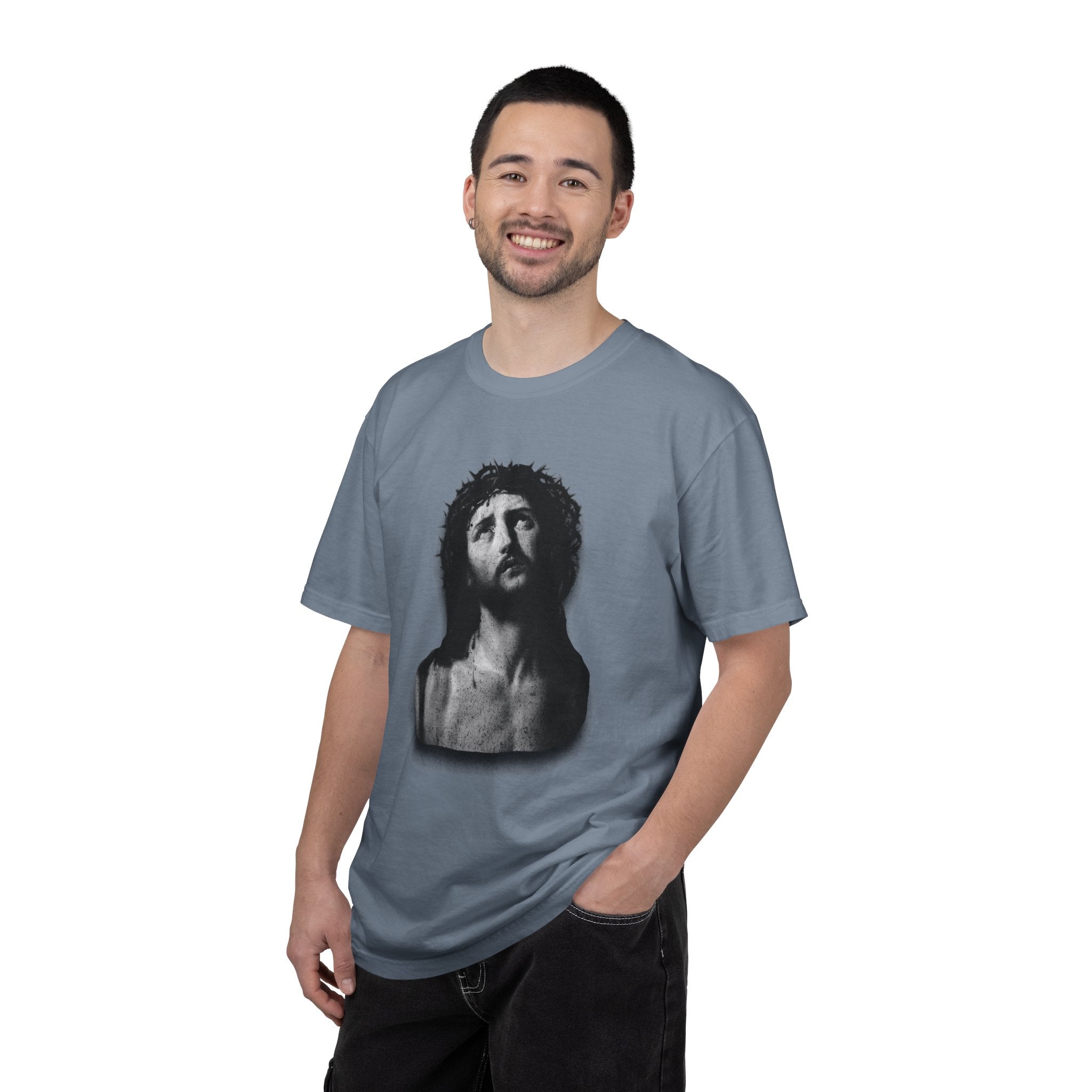 Man wearing a gray t-shirt with a graphic design on a white background