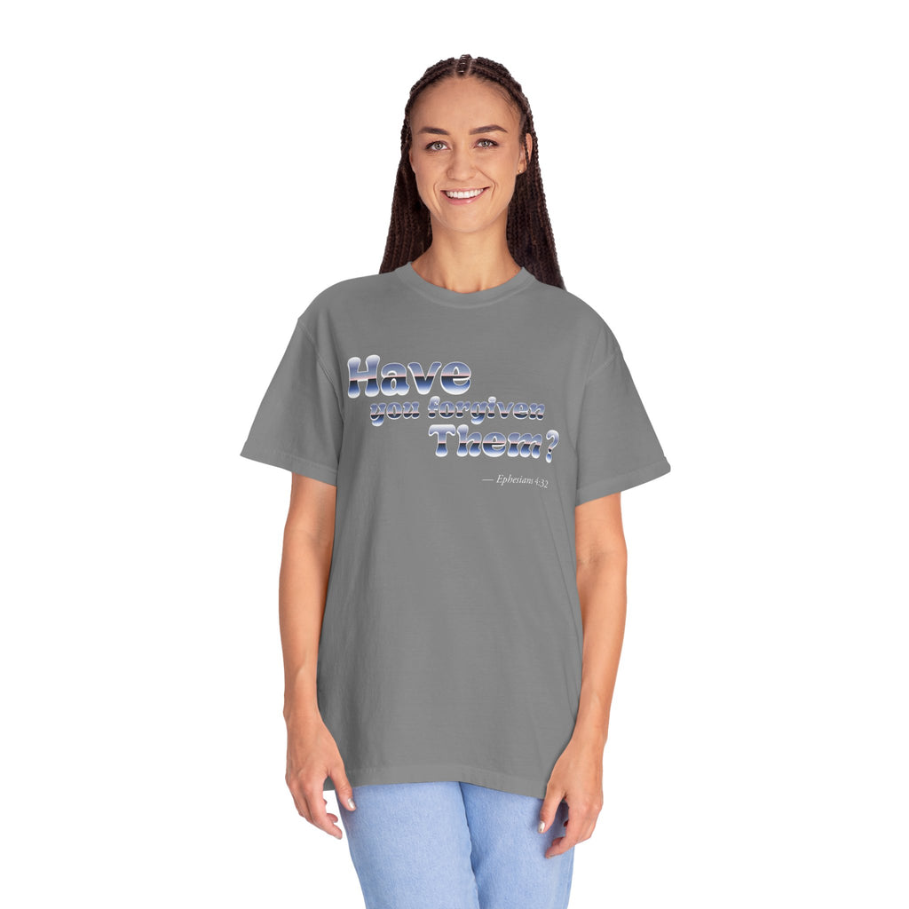 Person wearing a gray t-shirt with text on a white background