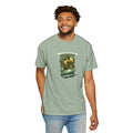 Man wearing a green t-shirt with a graphic design on a white background