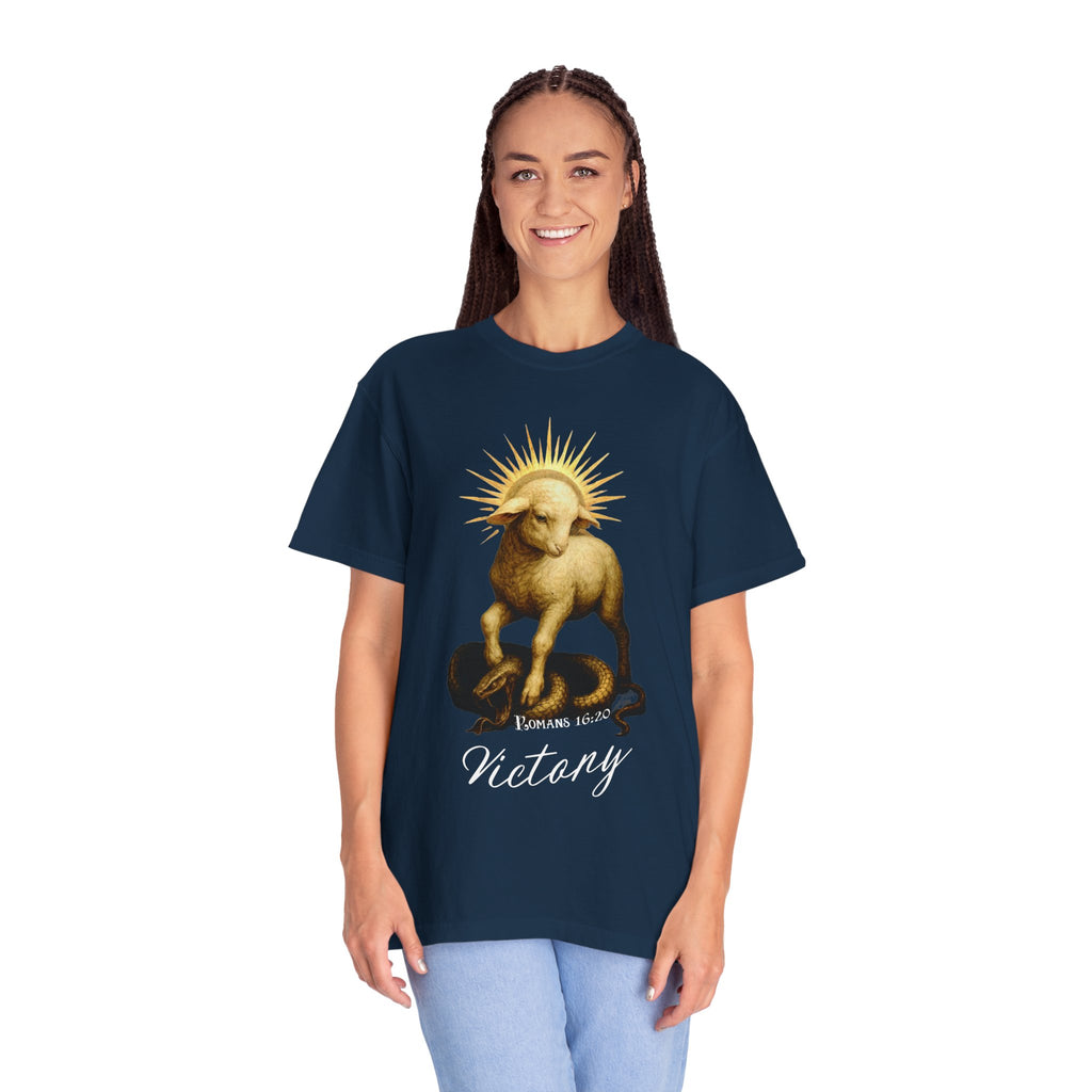 Person wearing a navy blue t-shirt with a lion graphic and 'Victory' text on a white background