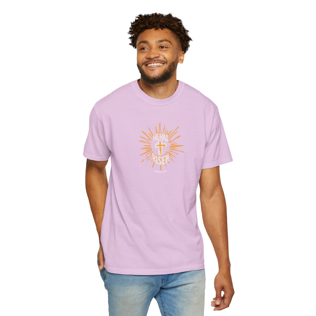 Man wearing a light purple t-shirt with a graphic design on a white background