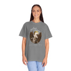 Woman wearing a gray t-shirt with a graphic design and text on a white background