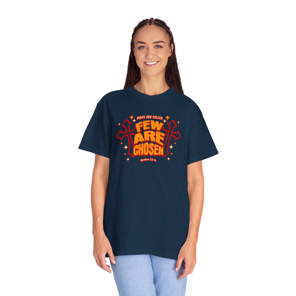 Person wearing a navy blue t-shirt with red and yellow text on a white background