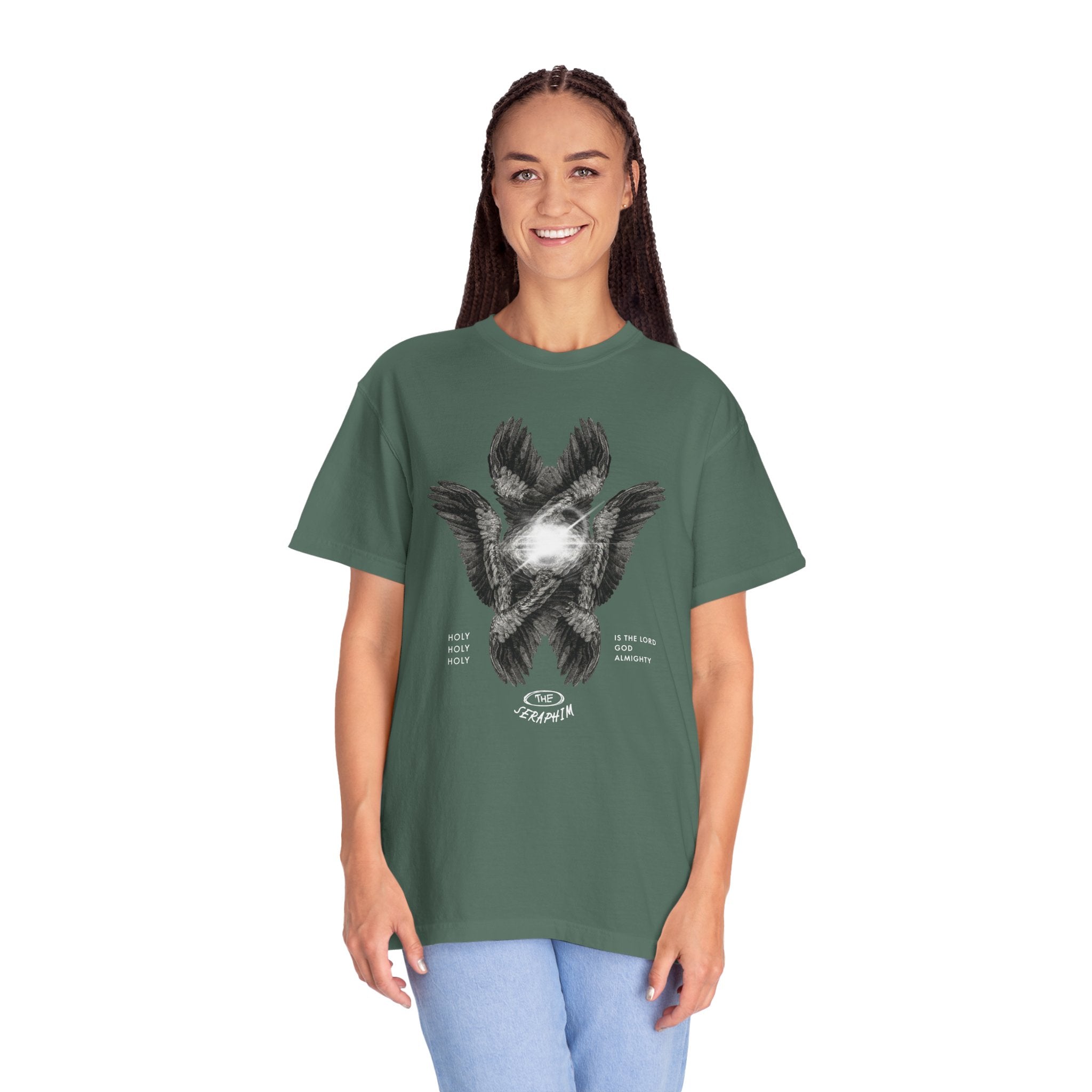 Woman wearing a green t-shirt with a graphic design on a white background