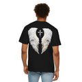 Person wearing a black t-shirt with white angel wings design on the back