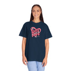 Person wearing a navy blue t-shirt with 'Faith over Fear' design on a white background