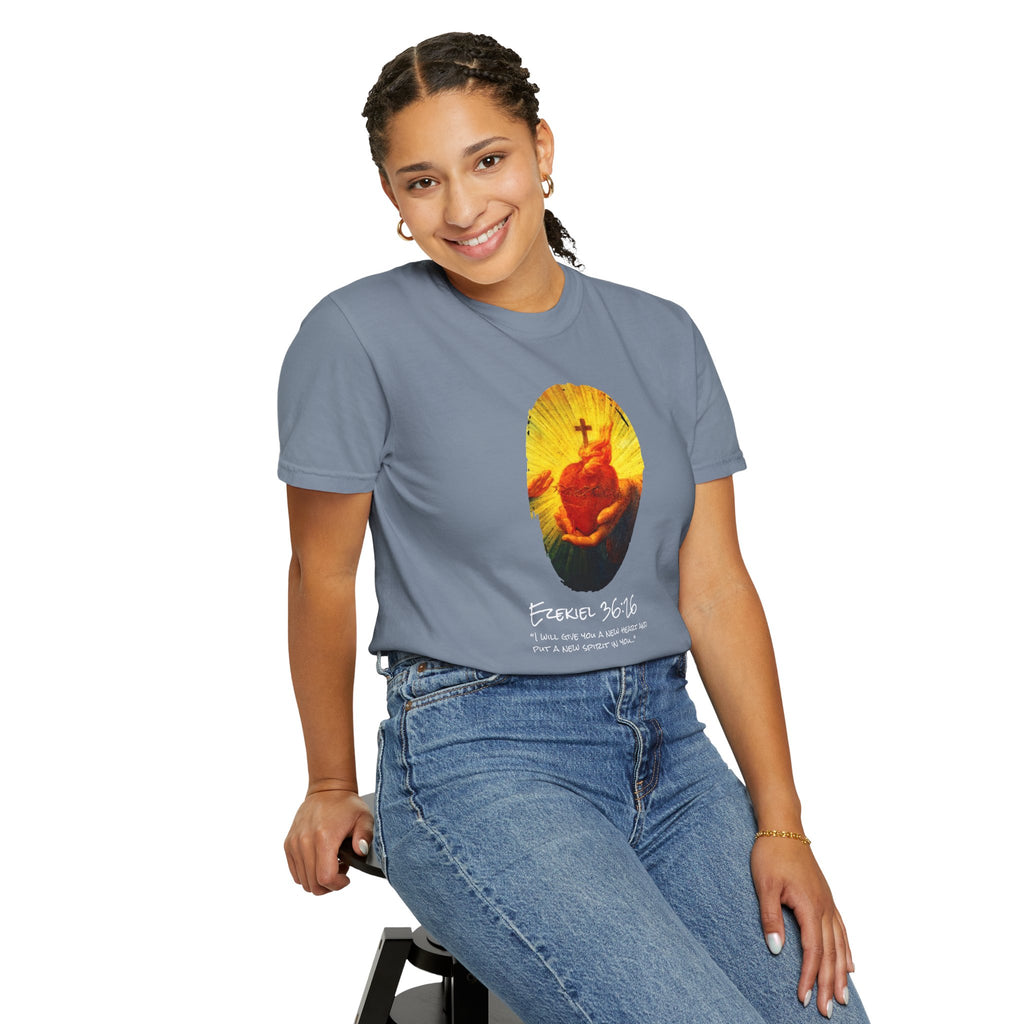 Person wearing a gray t-shirt with a colorful graphic design on a white background