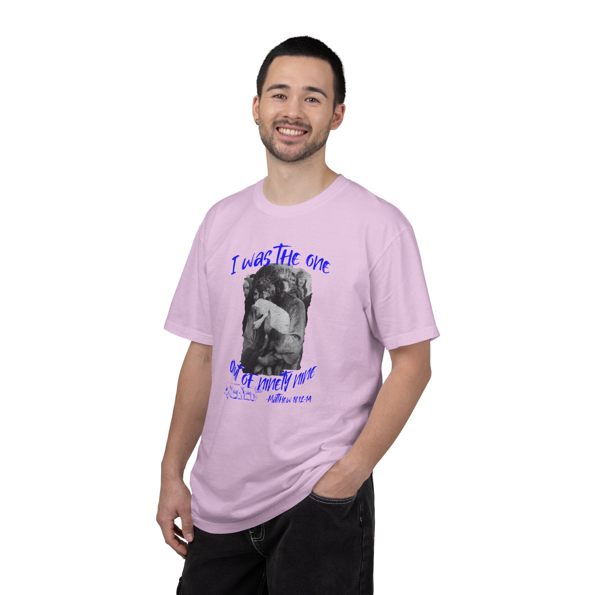 Person wearing a pink t-shirt with text and graphic design on a white background