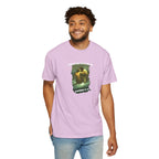 Man wearing a purple t-shirt with a graphic design on a white background