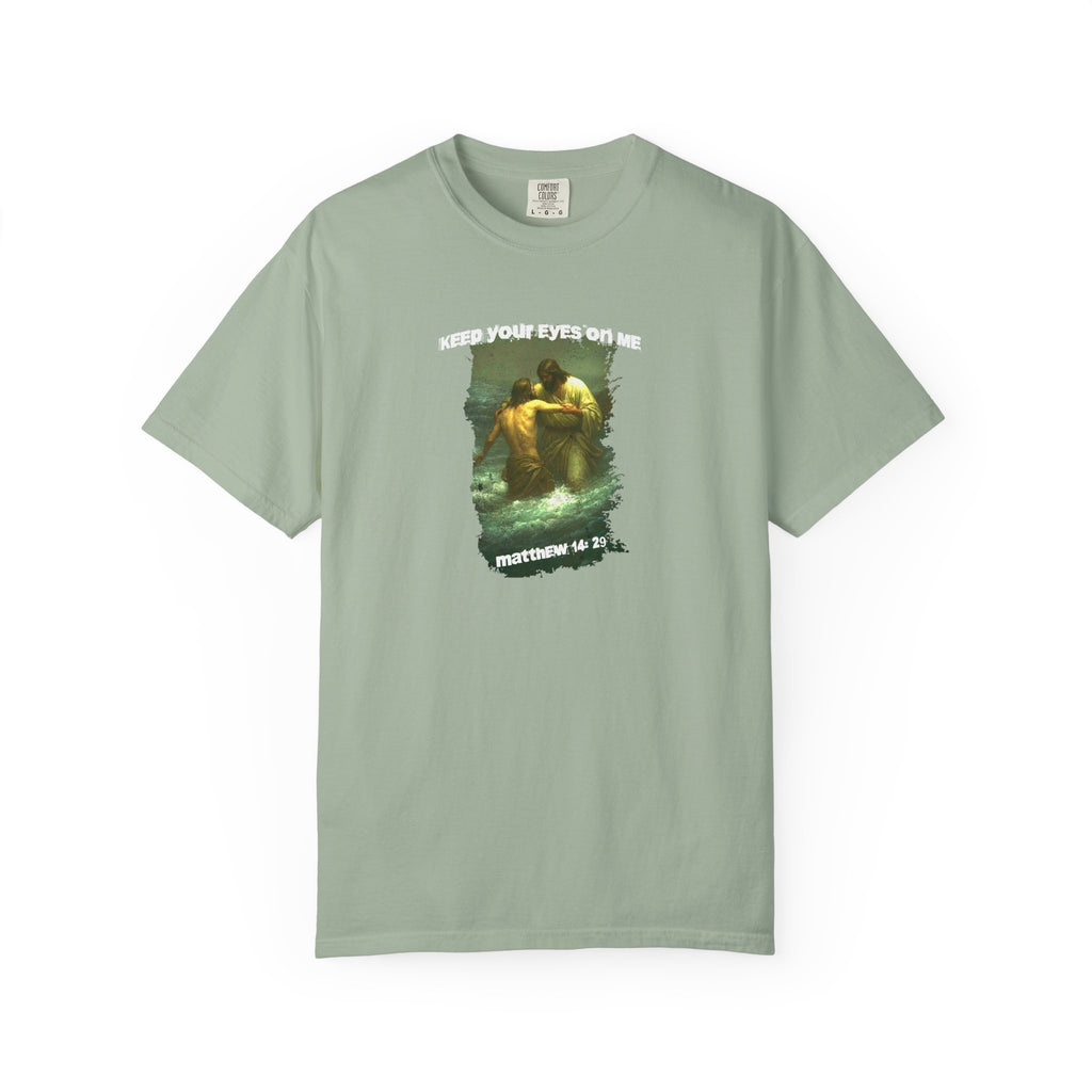Light green t-shirt with graphic design and text on a white background