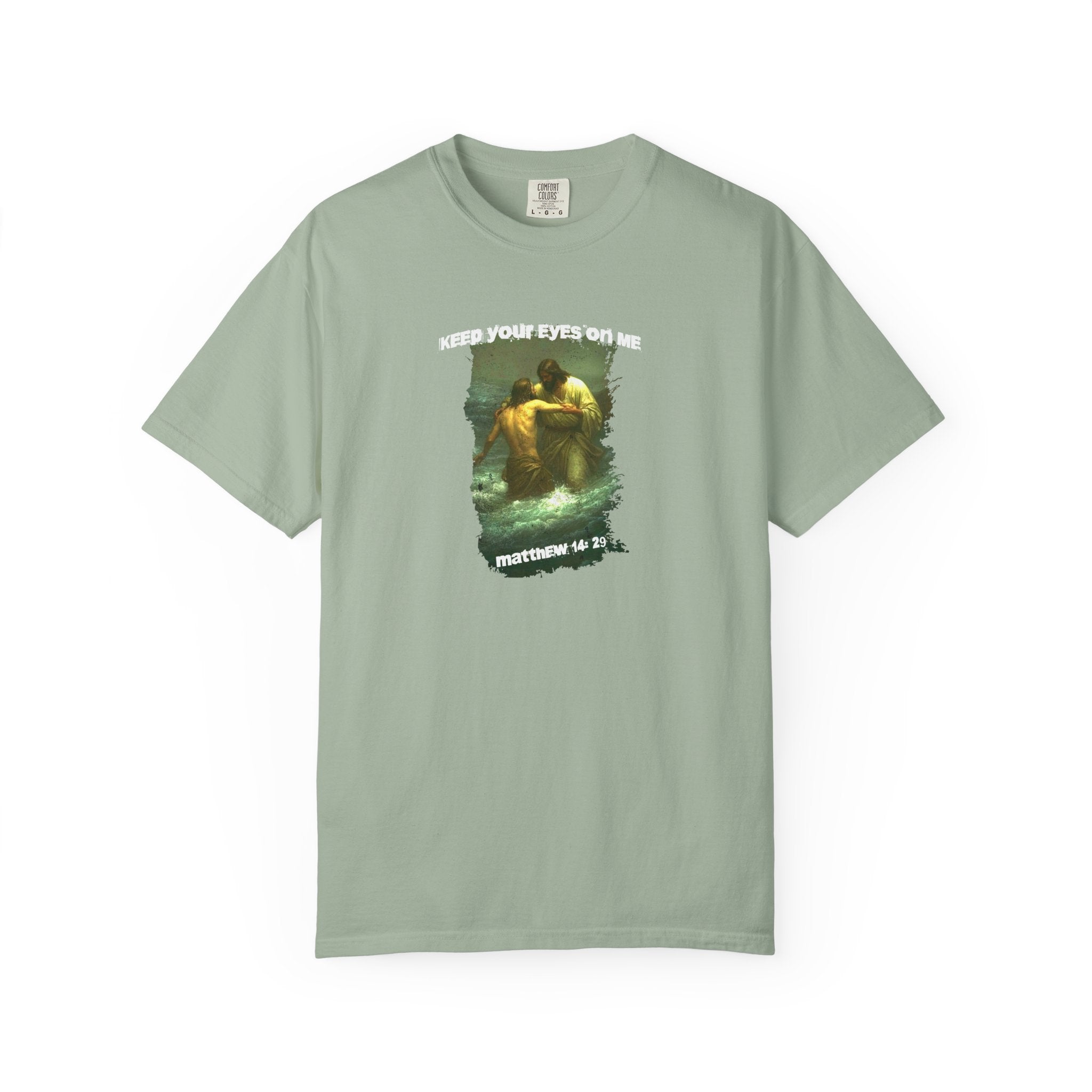 Light green t-shirt with graphic design and text on a white background