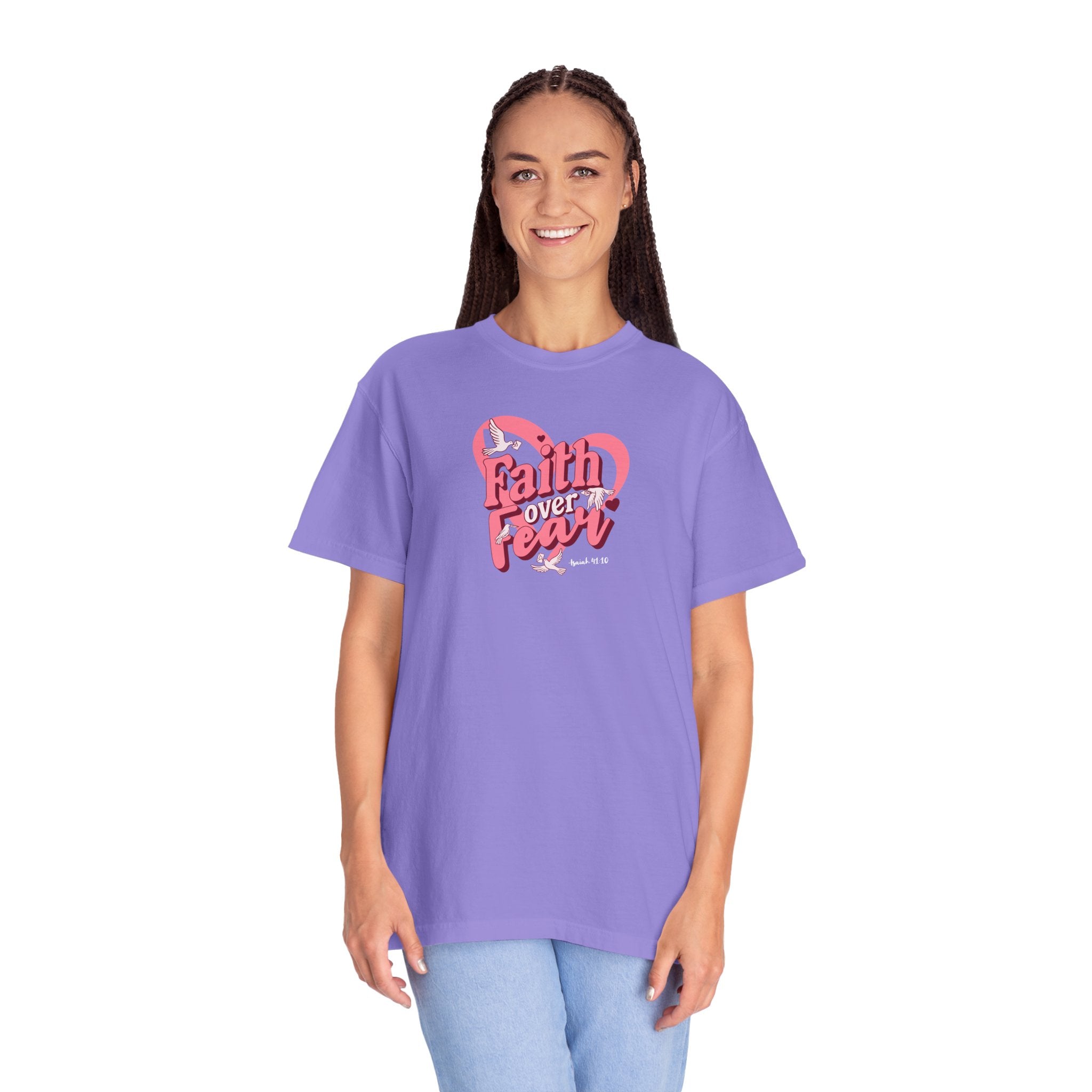 Person wearing a purple t-shirt with 'Faith over Fear' design on a white background