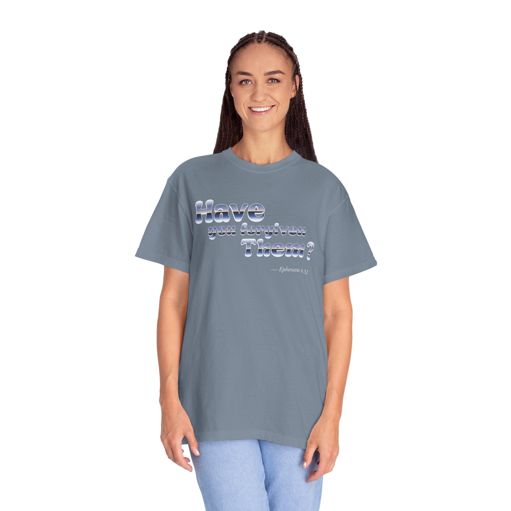 Person wearing a gray t-shirt with text on a white background