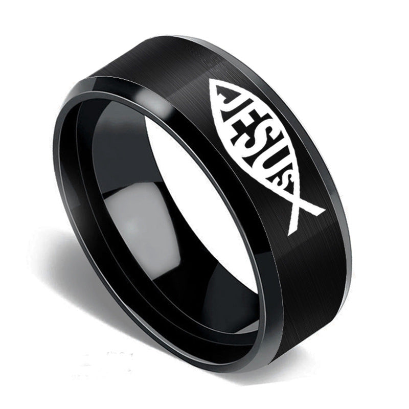 Black ring with 'Jesus' engraving on a white background
