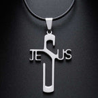 Silver 'Jesus' cross pendant on a black leather strap against a dark background