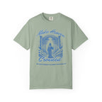 Green t-shirt with blue graphic and text on a white background