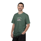 Man wearing a green t-shirt with a logo on a white background