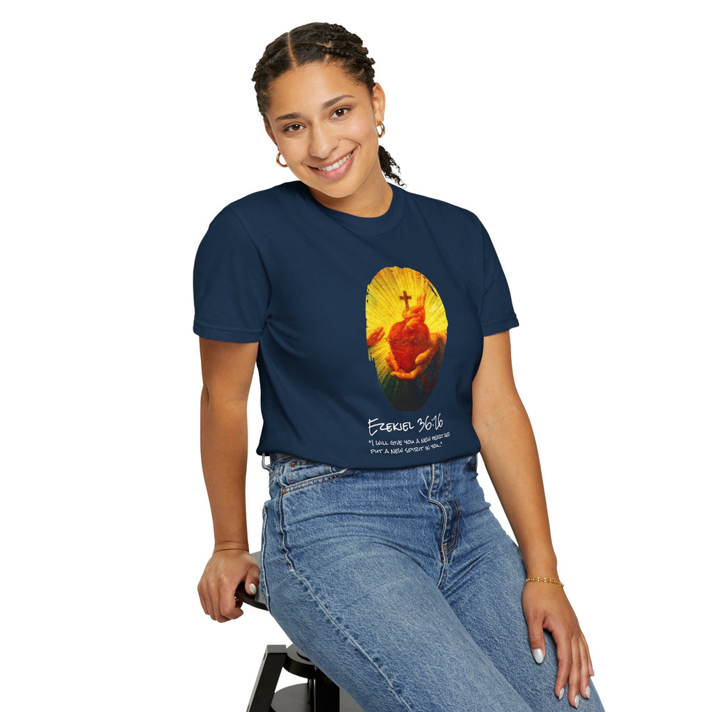 Person wearing a navy blue t-shirt with a colorful graphic design on a white background