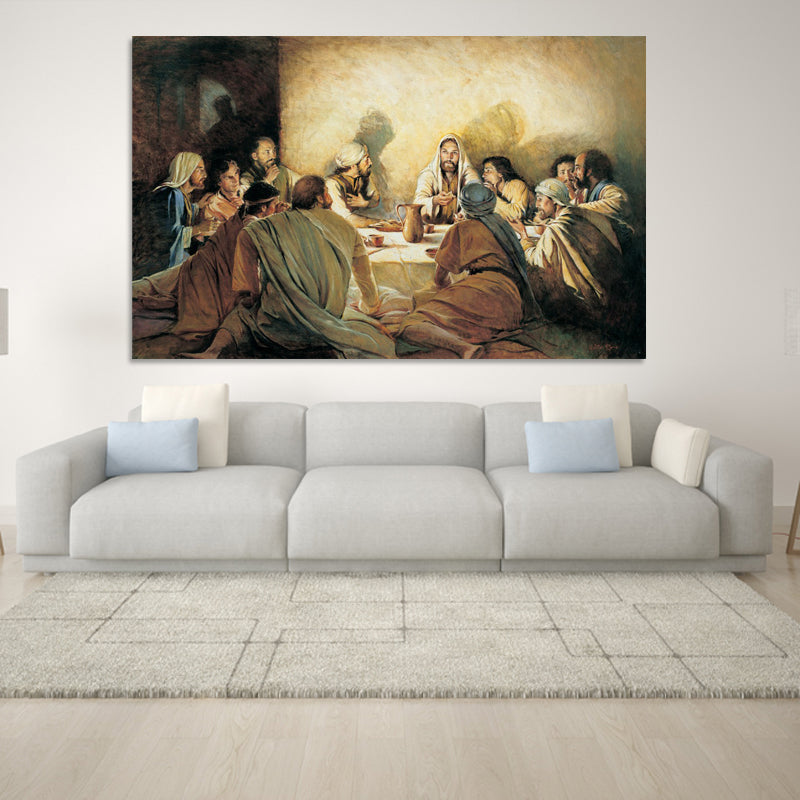 Painting of a religious scene above a gray sofa in a room.