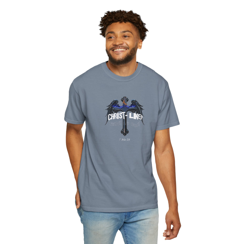 Man wearing a gray t-shirt with a graphic design on a white background