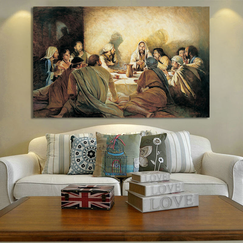 Painting of a religious scene above a sofa with decorative pillows and books.