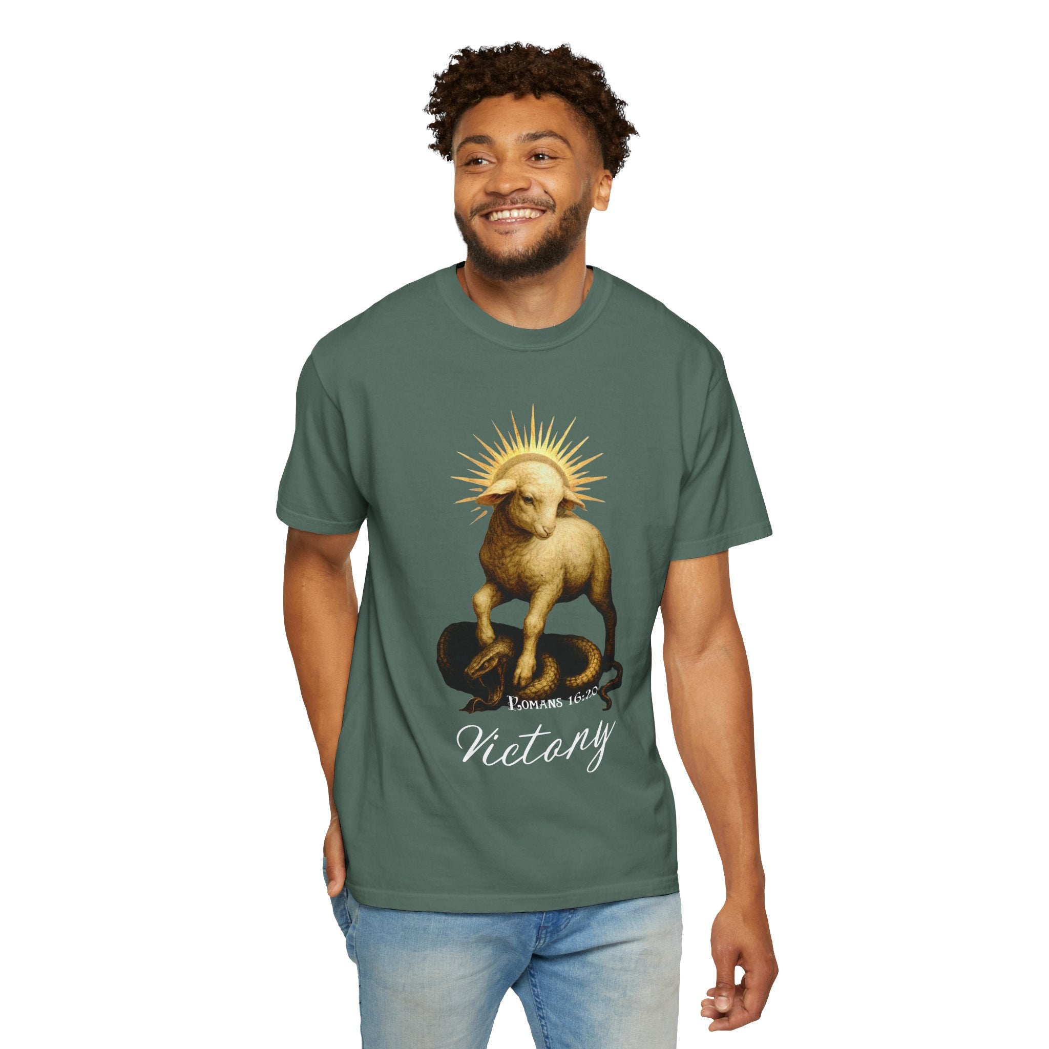 Man wearing a green t-shirt with a graphic design on a white background
