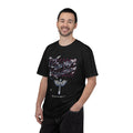 Man wearing a black t-shirt with graphic design and text on a white background