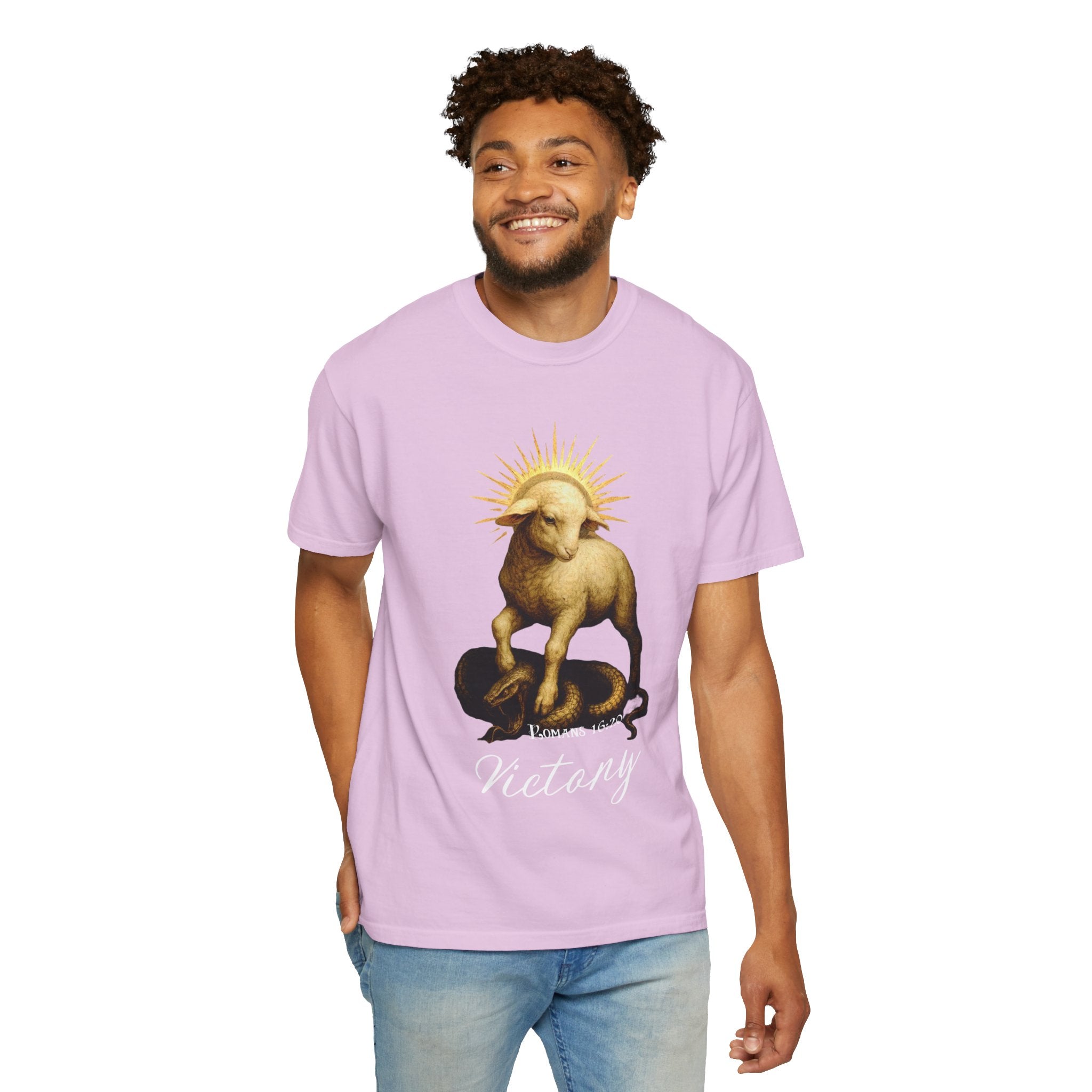 Man wearing a light purple t-shirt with a graphic design on a white background