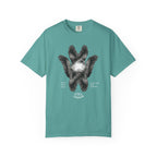 Teal t-shirt with a graphic design of a bird on a white background