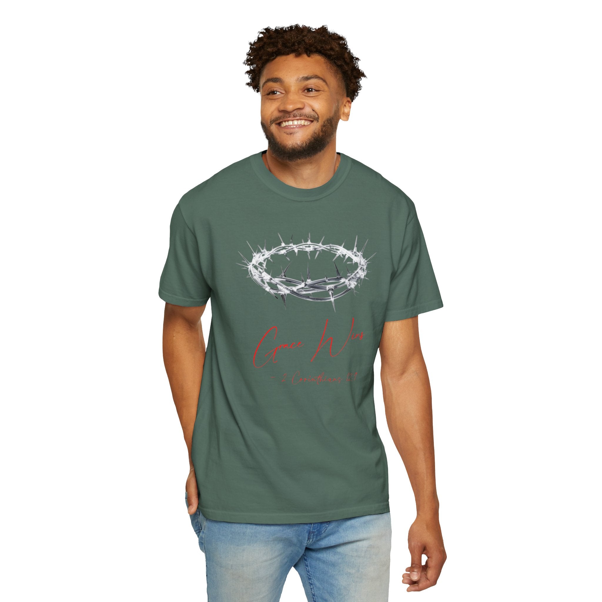 Man wearing a green t-shirt with a design on a white background