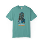 Teal t-shirt with a graphic of a religious figure and text on a white background