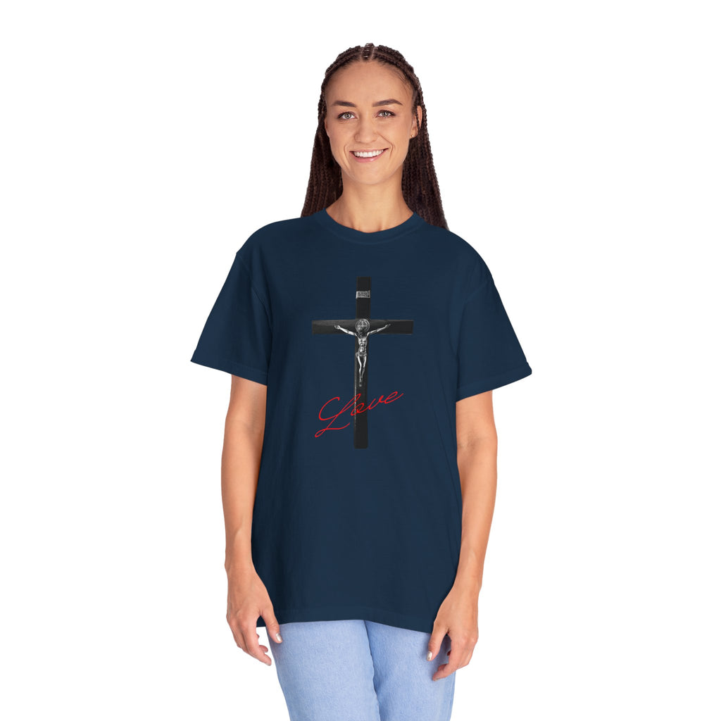 Person wearing a navy blue t-shirt with text on a white background